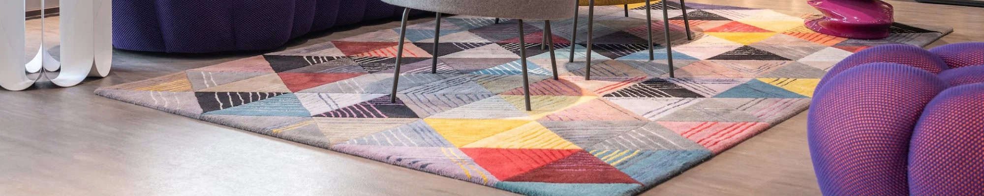 bright color carpet in ultra modern living room | Mitchell's Flooring & Design | Serving Northern Colorado | 970-352-7251 |