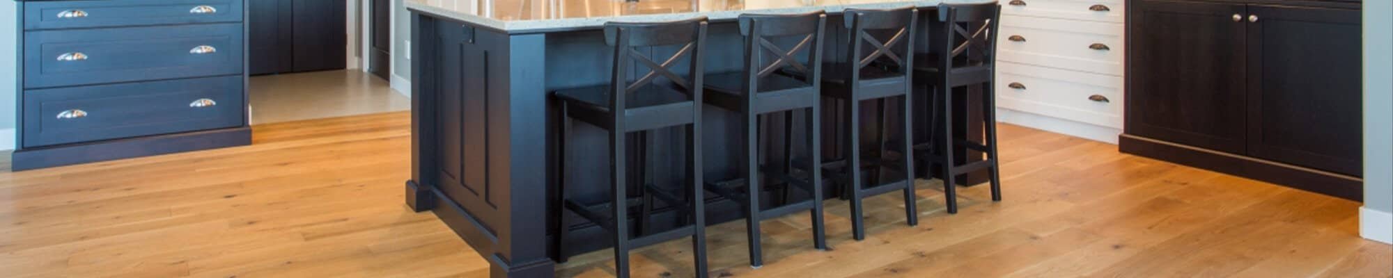 hardwood floors in traditional style kitchen with blue cupboards | Northern Colorado | 970-352-7251 |