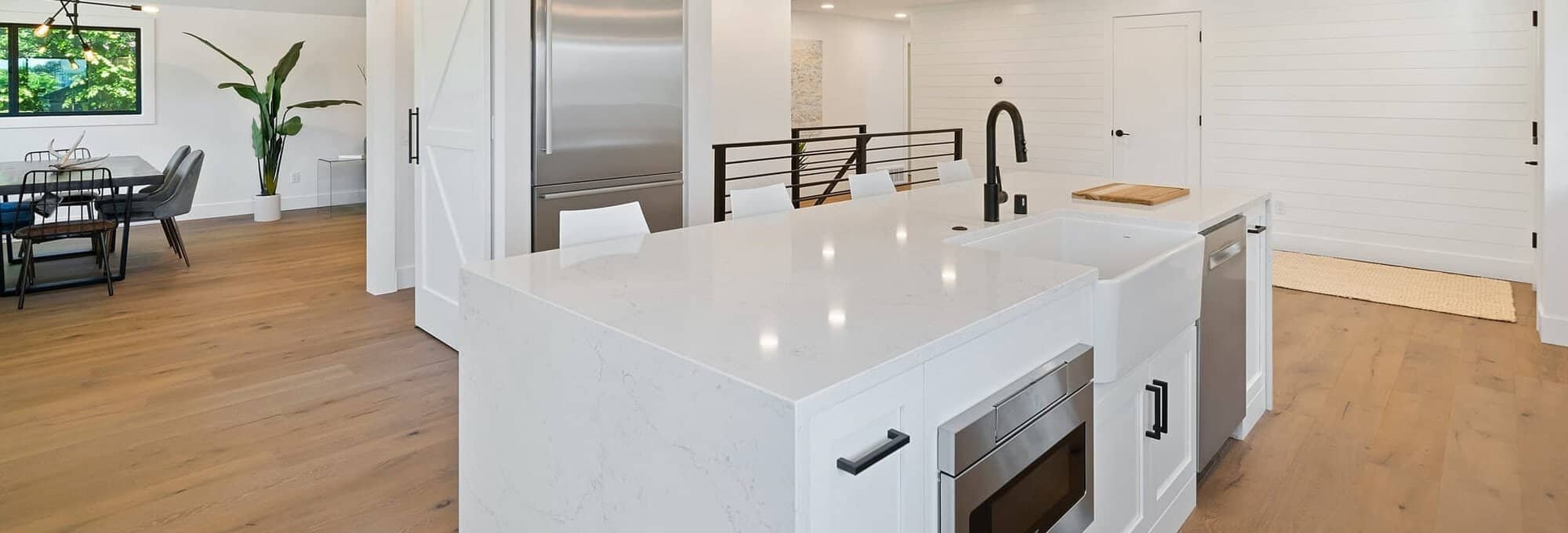 moisture resistant laminate flooring installed in modern kitchen | Northern Colorado | 970-352-7251 |