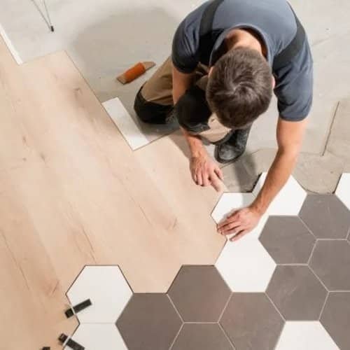 flooring installer combining ceramic and wood flooring in a modern pattern | Northern Colorado | 970-352-7251 |