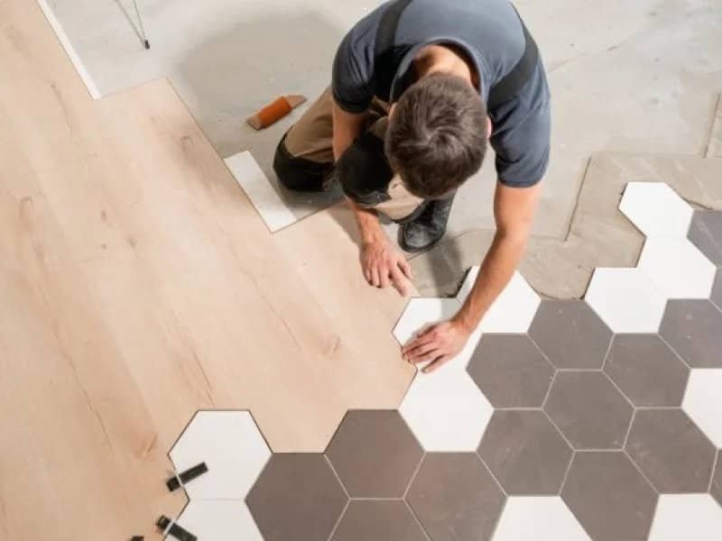 flooring installer combining ceramic and wood flooring in a modern pattern | Northern Colorado | 970-352-7251 |