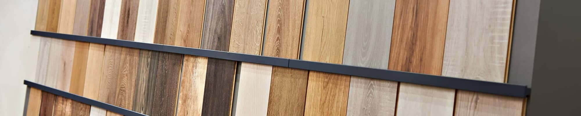 wall of flooring samples Mitchell's Flooring & Design | Serving Northern Colorado | 970-352-7251 |